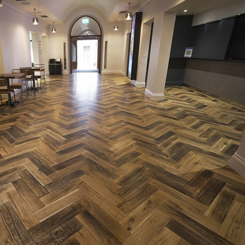 Large hall with dark oak herringbone floors