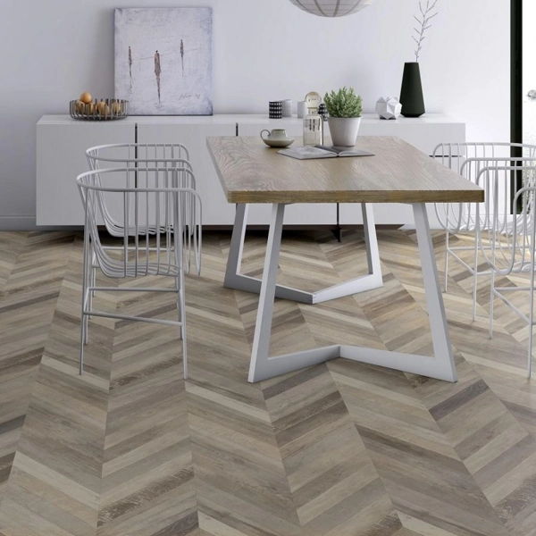 Multi-tone chevron flooring in a dining area